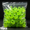 A clear plastic bag filled with 10 pieces of glow-in-the-dark resin alien cat and duck charms.