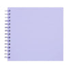 A blank purple spiral-bound notebook or scrapbook album.