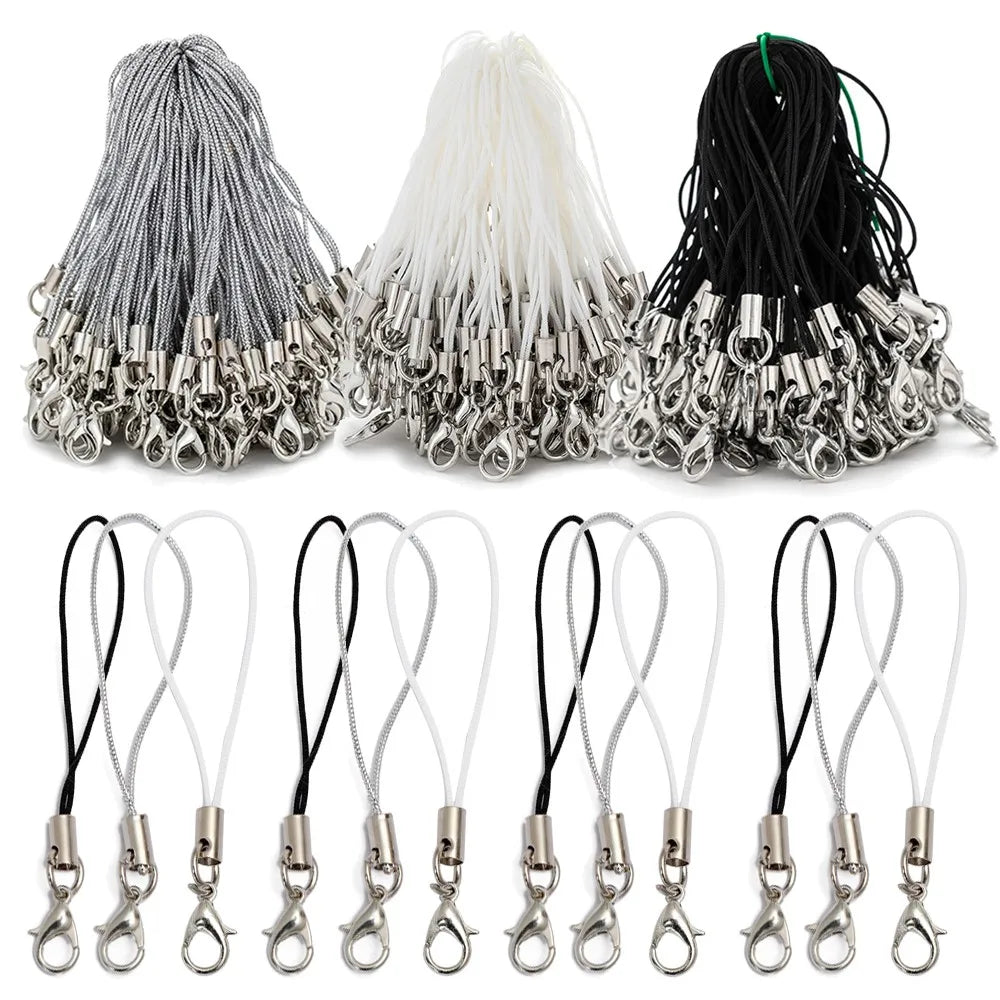 A collection of silver and black lobster clasp lanyards and straps for jewelry making