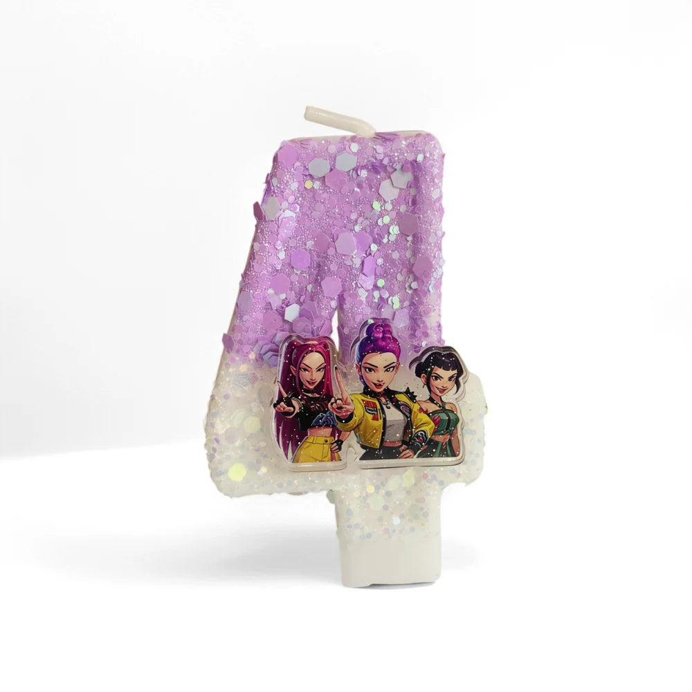 A purple glitter candle featuring three character figurines on a white wax base.