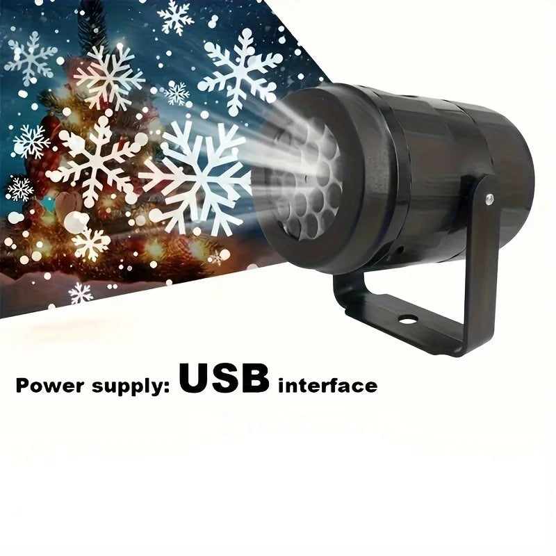A black USB rotating LED snowflake projection light is shown projecting snowflakes onto a festive background.