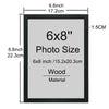 A rectangular black frame with a gray wooden photo insert, measuring 6x8 inches or 15.2x20.3 cm.