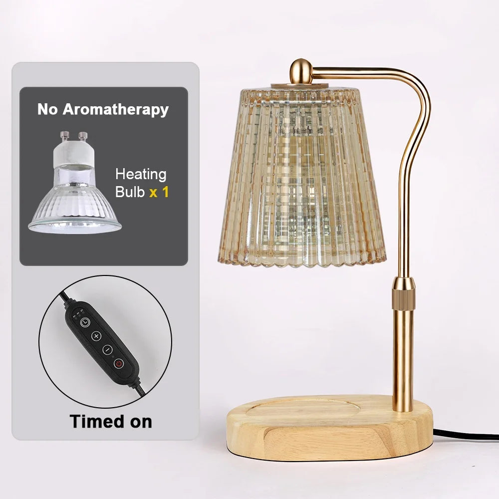 A brass adjustable electric candle warmer lamp with a textured glass shade and wooden base.