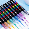 A set of 36 black acrylic paint markers with various colored tips lying on a white sheet of paper.