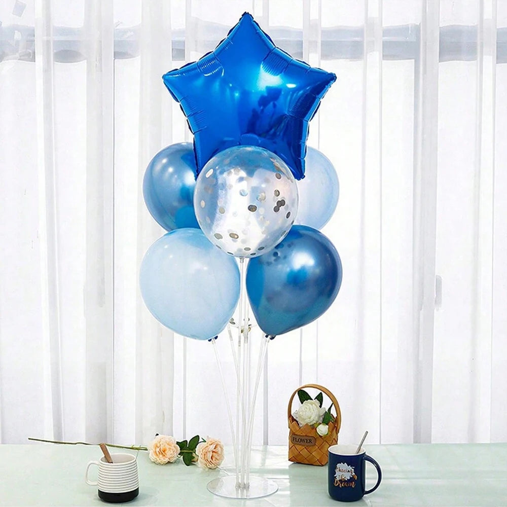 A collection of blue and silver balloons, including a star-shaped balloon, displayed on an adjustable stand.