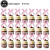 A set of 40 pink bow cupcake toppers measuring 4x11cm.
