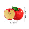 A bright red apple with a green leaf, used as a 3D simulation fruit fridge magnet.