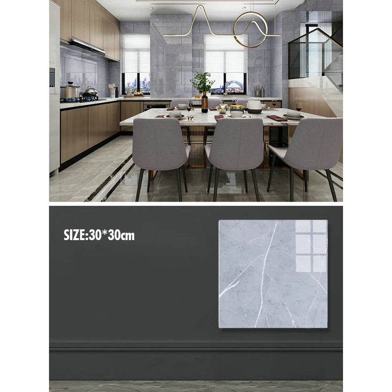A close-up of a gray marble wall decal featuring white veining, used as a kitchen or bathroom surface.
