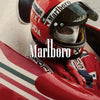 A close-up of a racing helmet and suit featuring Marlboro branding in red and white colors.