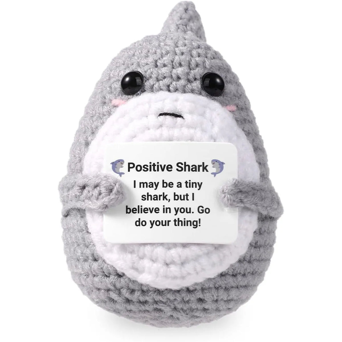 A handmade crochet emotional support donkey ornament in gray and white yarn.