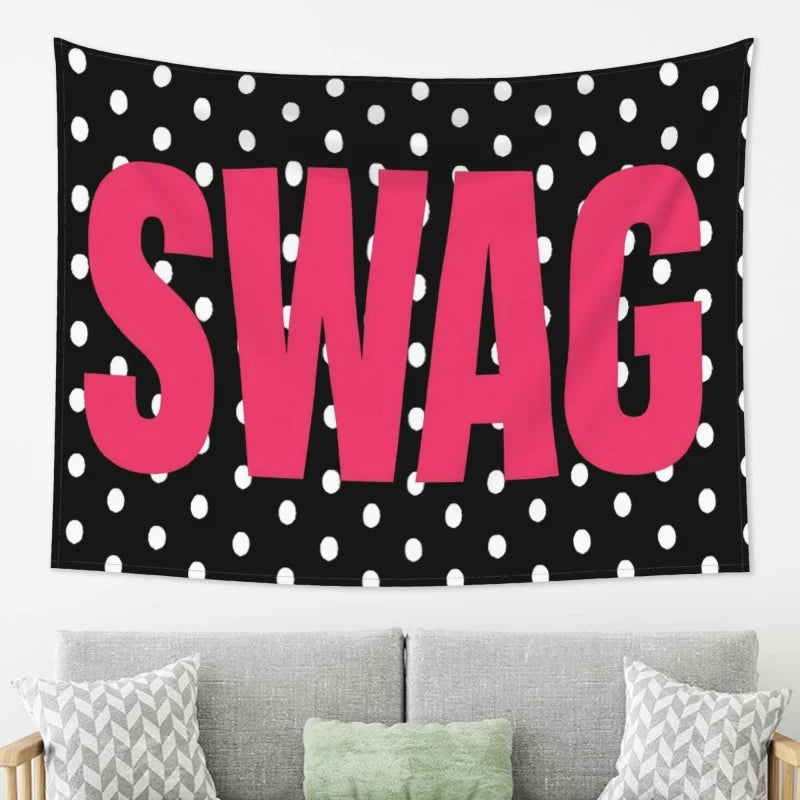 A black tapestry with large pink polka dots featuring the word SWAG in bold letters.