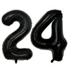 A set of two giant black foil balloons shaped like the number 24