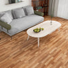 A light wood grain floor sticker pattern is shown on a wooden floor, with a modern sofa and coffee table in the background.