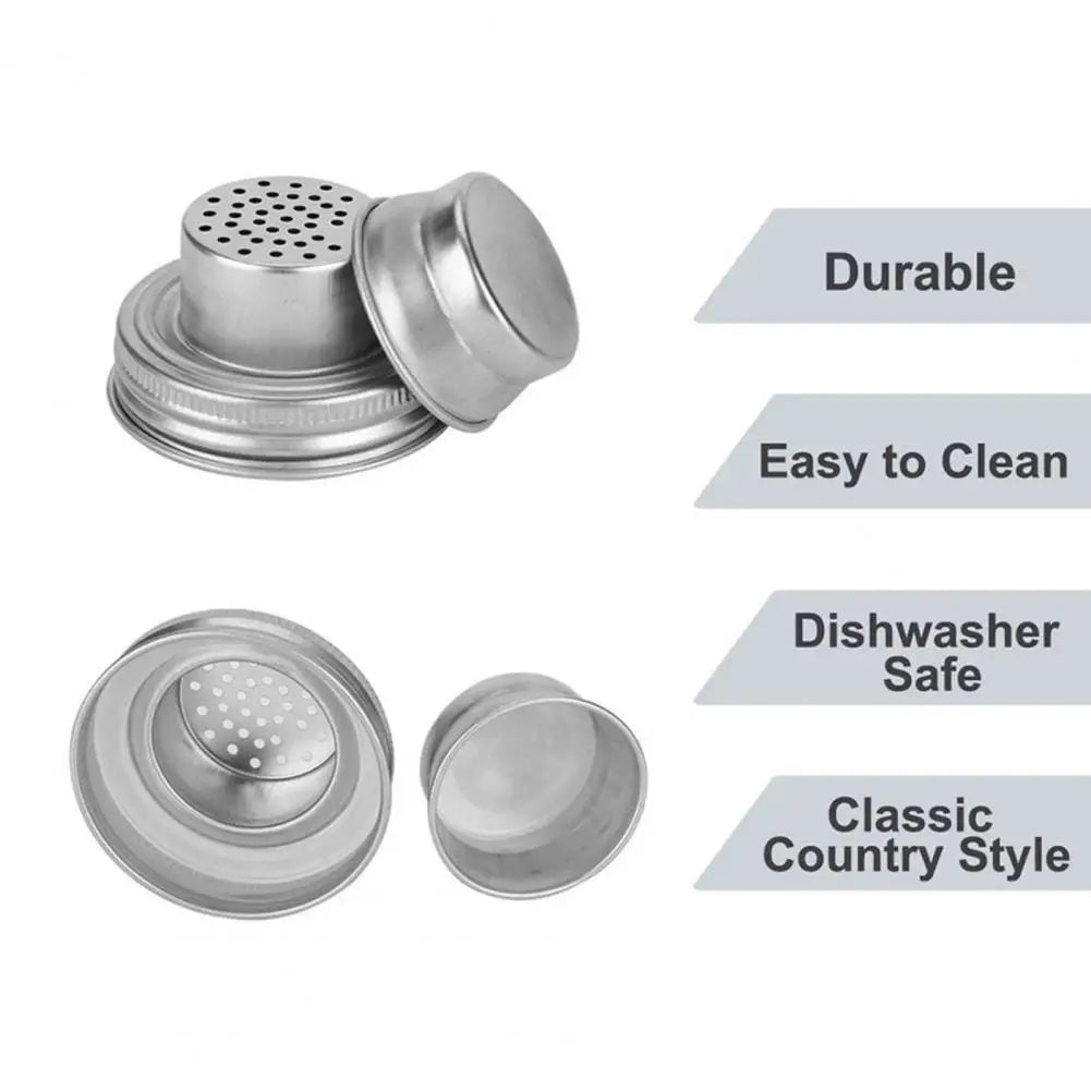 Stainless steel mason jar shaker lid with a perforated top and a smooth cap for seasoning and cocktails
