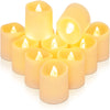 Eine Sammlung von zehn blassgelben Flammenlose LED-Kerzen in verschiedenen Größen und Formen.