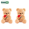 Brown teddy bear plush toy with red faux flowers
