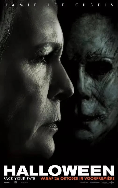 A dark, dramatic movie poster featuring two faces, one modern and one menacing, with the title Halloween.