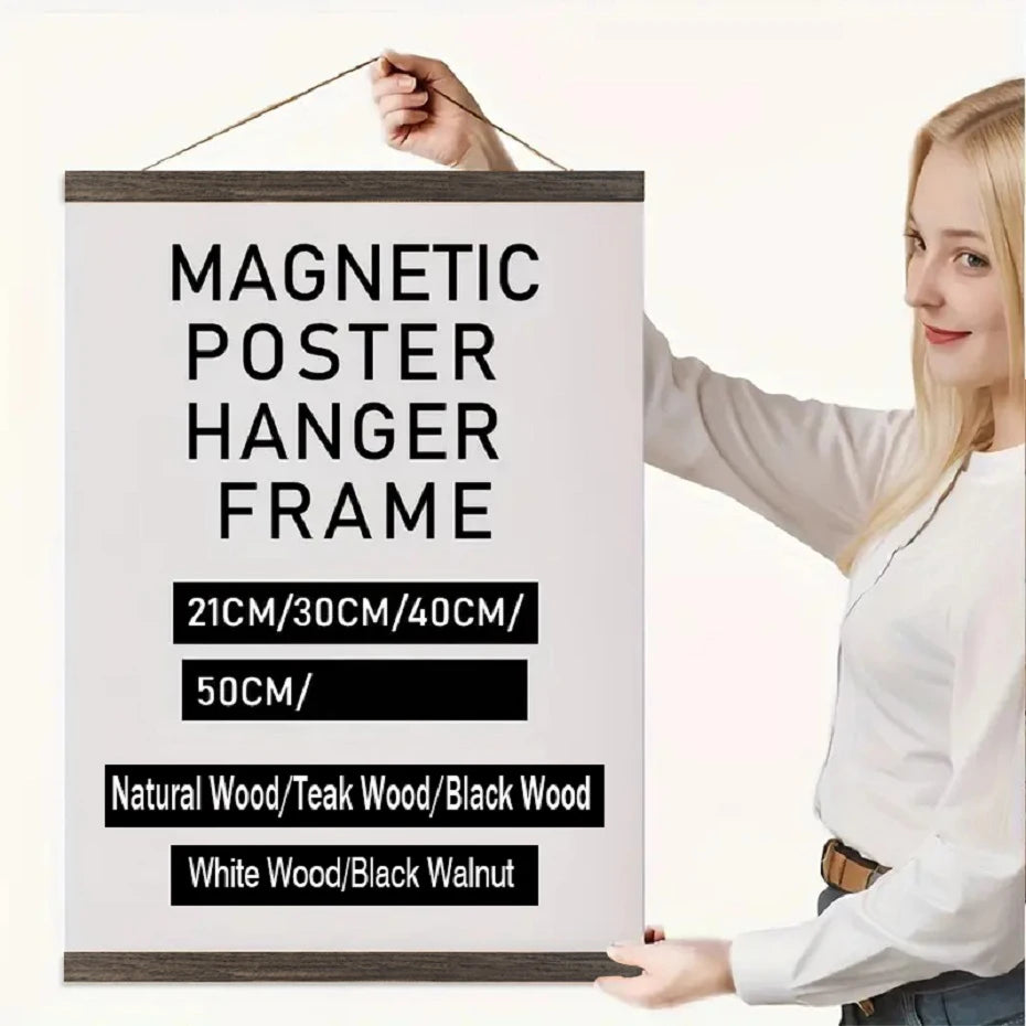 A woman holds a magnetic poster hanger frame made of natural wood, showing various sizes and finishes.