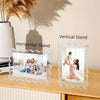 A set of magnetic acrylic photo display frames, including a vertical and horizontal stand, displayed on a wooden surface.