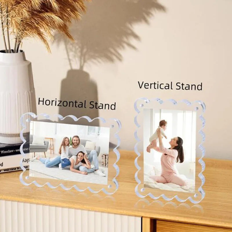 A set of magnetic acrylic photo display frames, including a vertical and horizontal stand, displayed on a wooden surface.