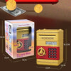 A yellow automatic money box with a red accent, shown next to bills and coins.