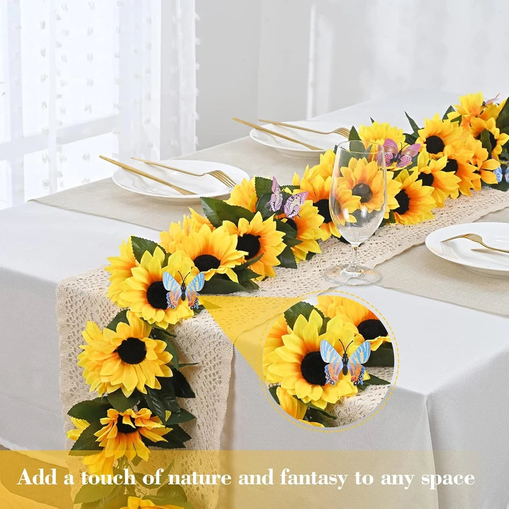 A silk sunflower vine garland with purple butterflies is displayed on a white tablecloth.