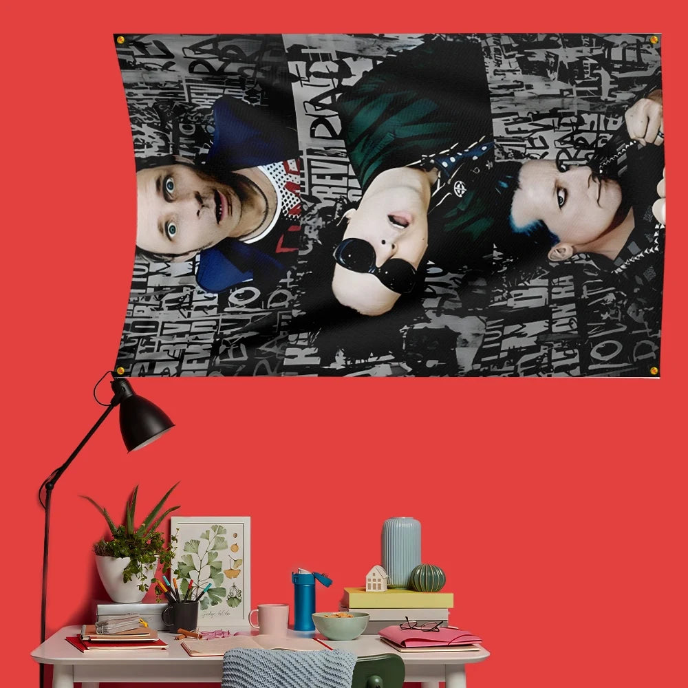 A decorative banner featuring a black and white photo collage of Green Day members.