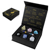 A black gift box containing a natural stone zodiac bracelet and various crystals, labeled Libra.