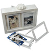 A white 3D rotating photo holder with twelve clear display pockets and a separate frame.