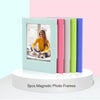 Five colorful magnetic photo frames standing upright on a white circular base