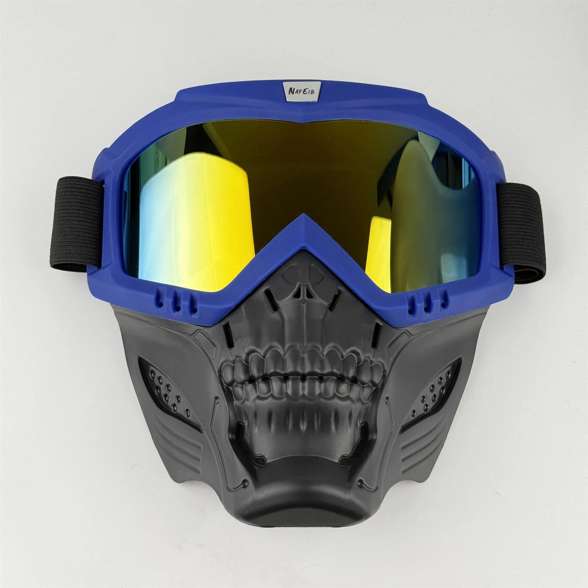 A pair of blue full face goggles with a yellow-tinted lens and a black protective mask.