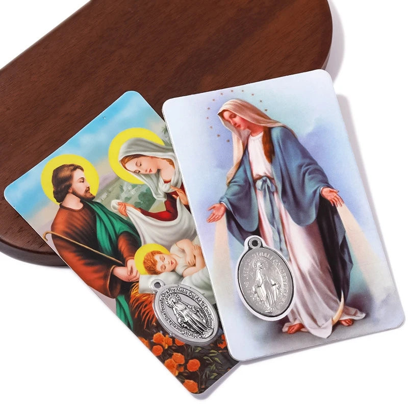 A white card featuring an image of Saint Jude Thaddeus with a halo and a protective pendant.