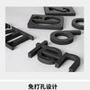 Black acrylic numbers and design pieces for a wall clock featuring a creative design.