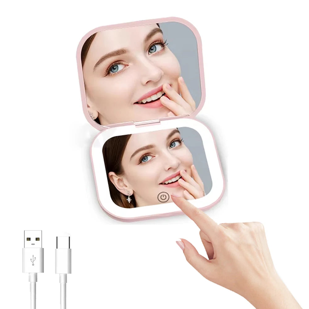 A hand holds a compact portable vanity mirror with dual magnification, showing a woman's face.