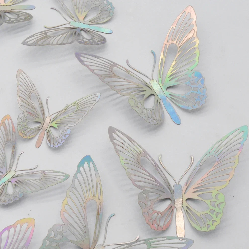 A collection of metallic gold and silver butterfly cake toppers.