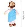 A plush doll depicting Jesus with a beard and a white robe, standing next to a vertical measurement scale.