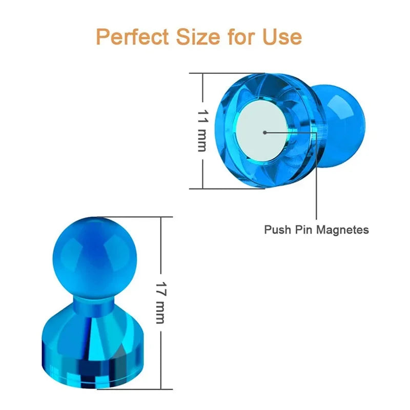 A close-up view of a clear blue plastic pin magnet with a circular opening and a larger spherical version.