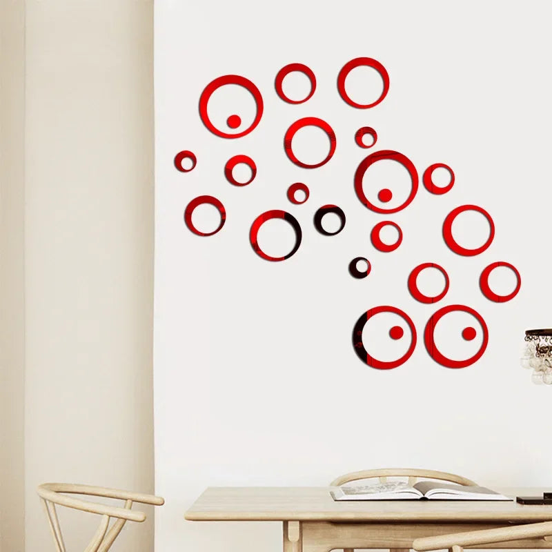 Red and black circular polka dot acrylic mirror wall stickers scattered on a white wall.