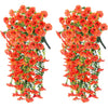Two sets of artificial orange and red morning glory flowers with green eucalyptus leaves used for hanging decor