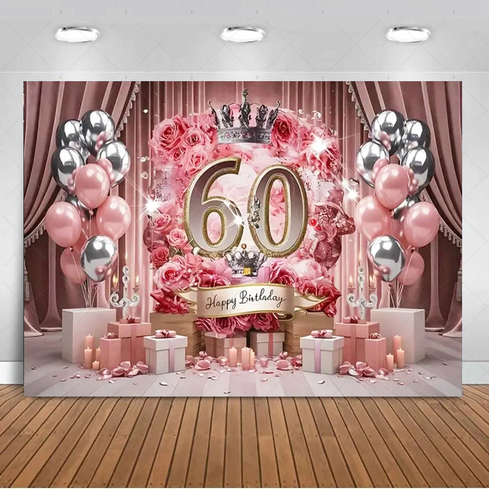 A pink and gold balloon backdrop for a 60th birthday photo booth featuring roses, balloons, and a crown.