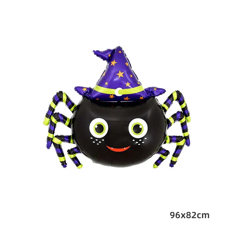 A large Halloween foil balloon shaped like a bat, pumpkin, ghost, and monster with purple and yellow accents.