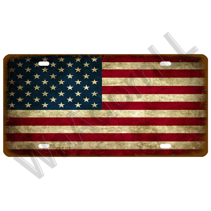 A vintage metal tin sign shaped like the American flag with distressed texture.