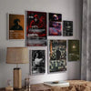 A gallery wall display of various rapper music album posters featuring dark and vibrant artwork.