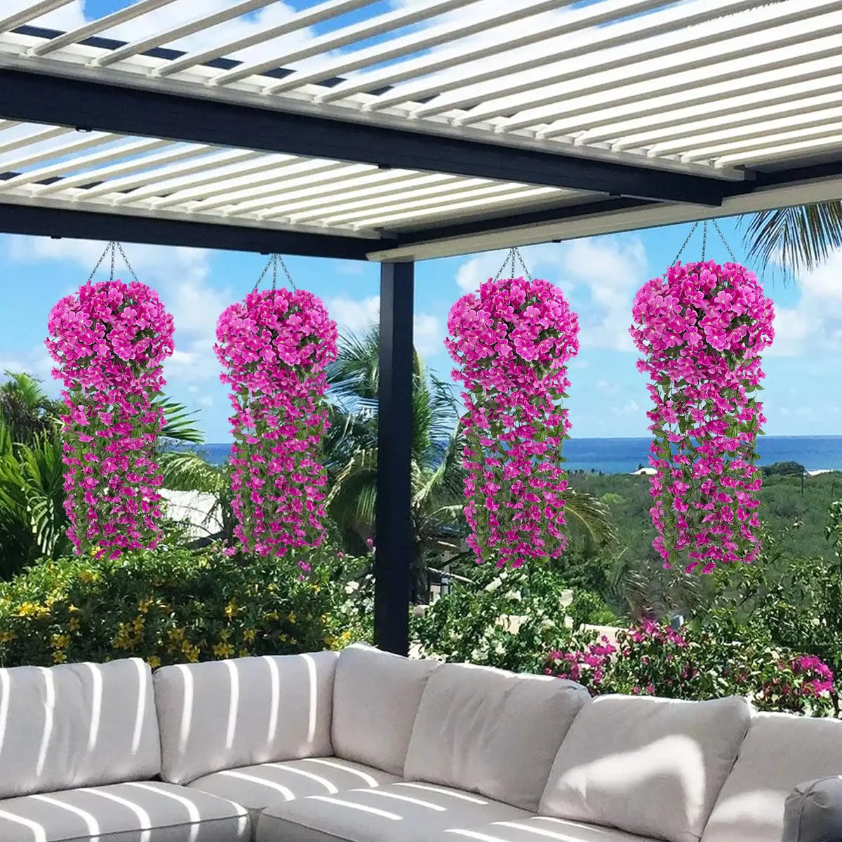 Pink artificial violet ivy hanging garlands decorating an outdoor patio or garden area.