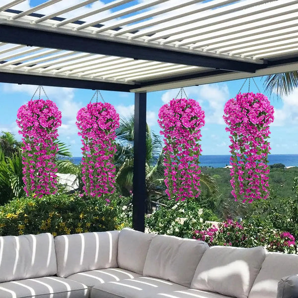 Pink artificial violet ivy hanging garlands decorating an outdoor patio or garden area.