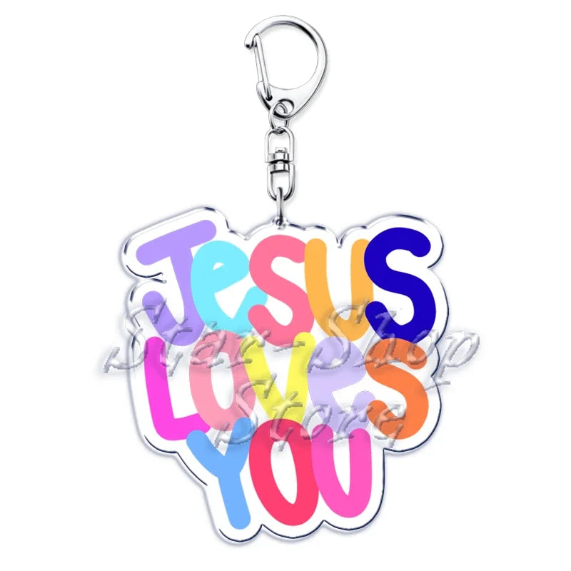 Silberner Acryl-Anhänger mit der Aufschrift Jesus liebt dich in farbiger Schrift