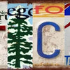 A vintage metal sign featuring the word CAVE spelled out in various colored letters on a rustic background.