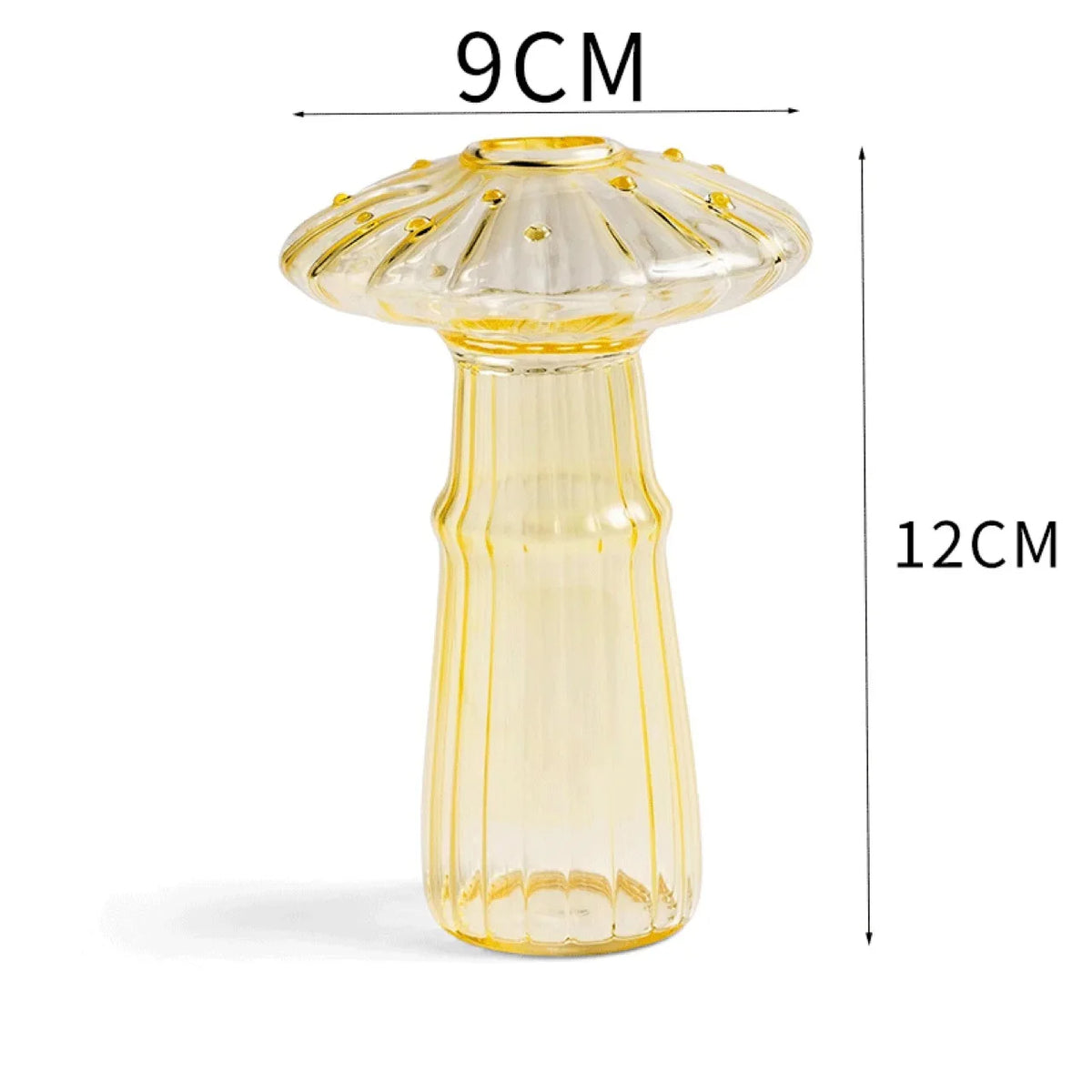 A tall, translucent yellow glass vase shaped like a mushroom with a textured cap.