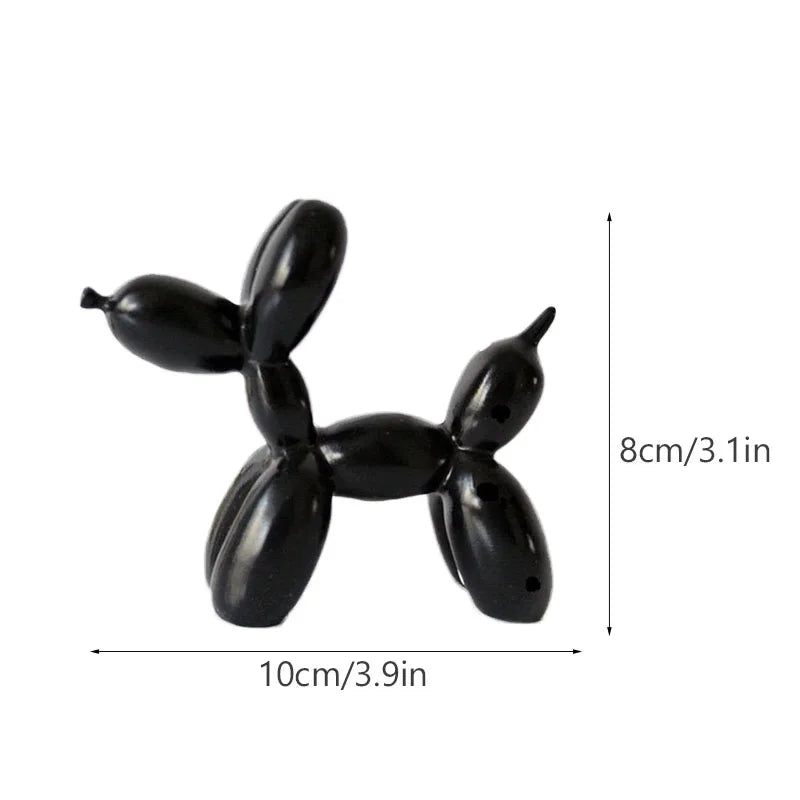 Black resin sculpture of a dog made from balloon shapes for modern home decor