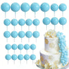A set of light blue foam cake toppers on sticks for decoration.